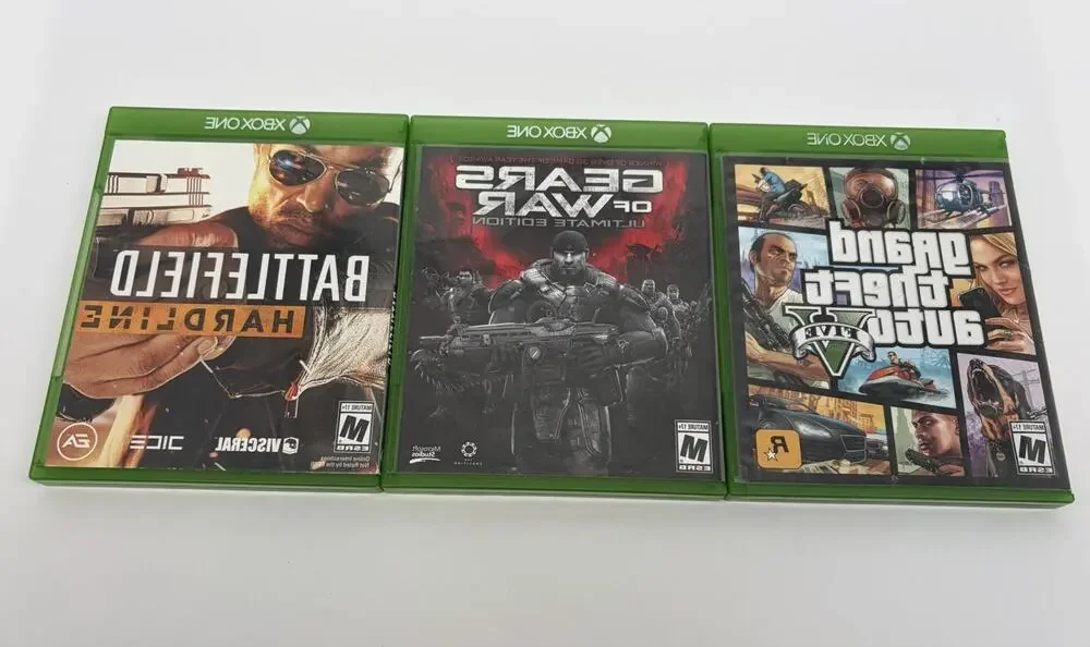 Xbox One Game Lot of 3 GTA V Gears of War Ultimate Battlefield Hardline